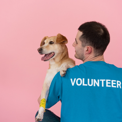 volunteer with a dog